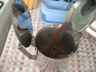 Pour half the espresso from moka pot maker 
