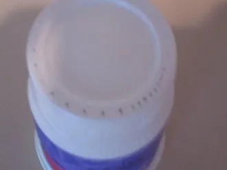 Drilled holes in the cup.
