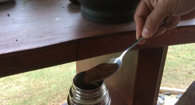 add ground coffee