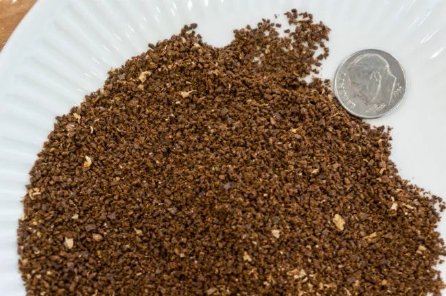aeropress coffee grind level next to dime