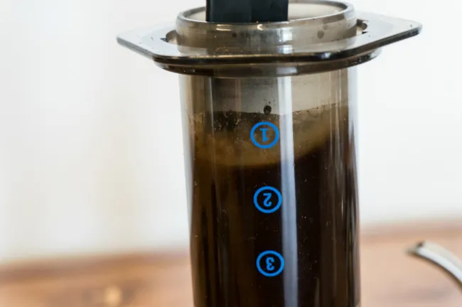 stir Aeropress coffee with paddle