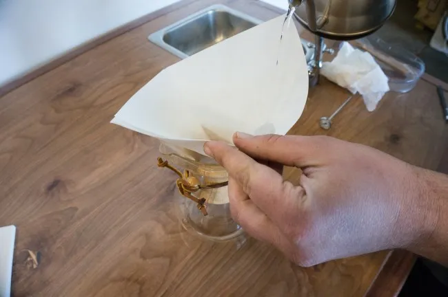 rinse chemex coffee filter with hot water