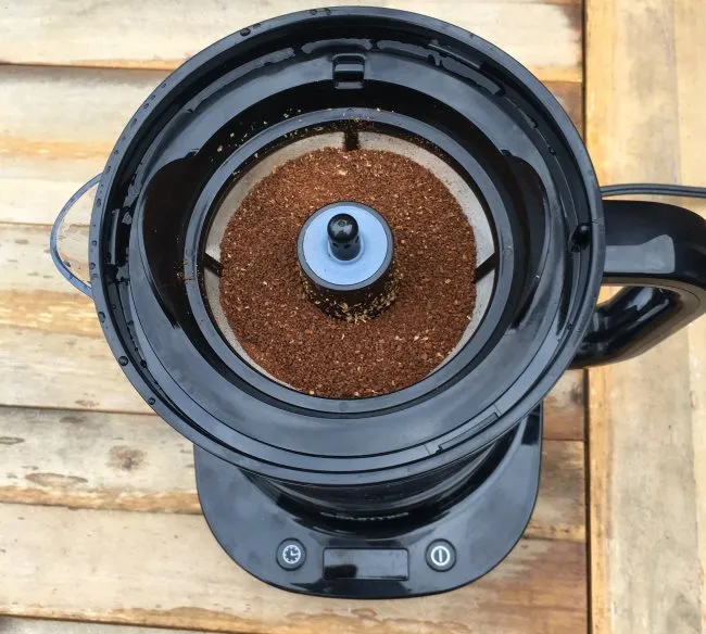 Place Coffee Basket with grounds