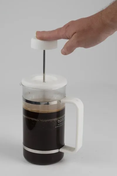 french press coffee plunging
