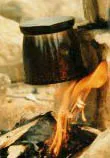 Brewing coffee over fire