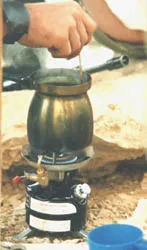 Stir campfire coffee