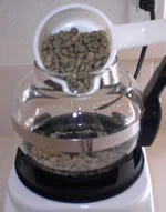 pour green beans into roaster