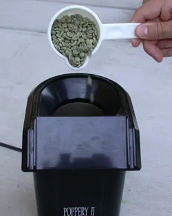 pour coffee into roaster
