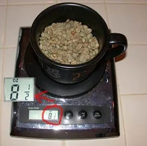 kitchen scale weighing green coffee