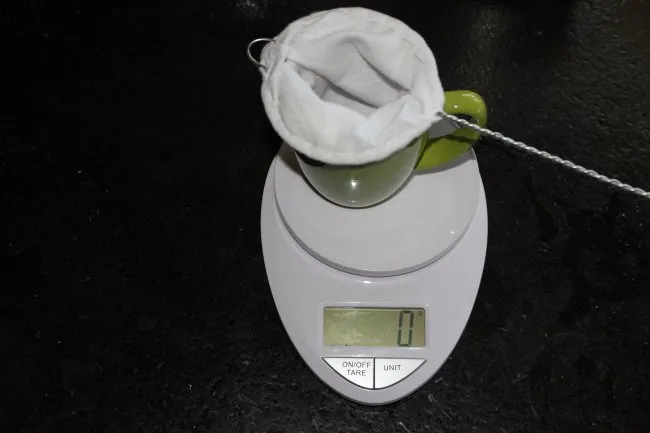 Place sock into mug