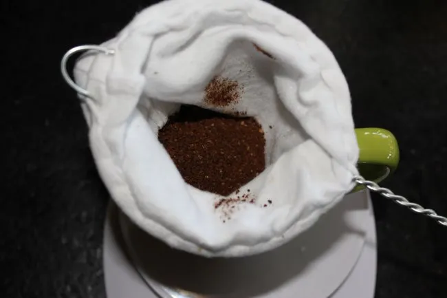 add ground coffee