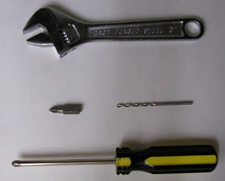 A 3/32 drill bit worked well