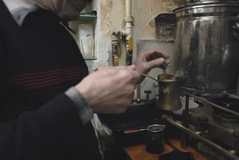Pour water into cup