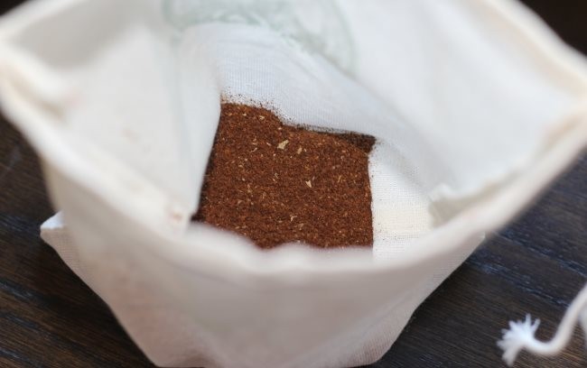 add ground coffee to pouch